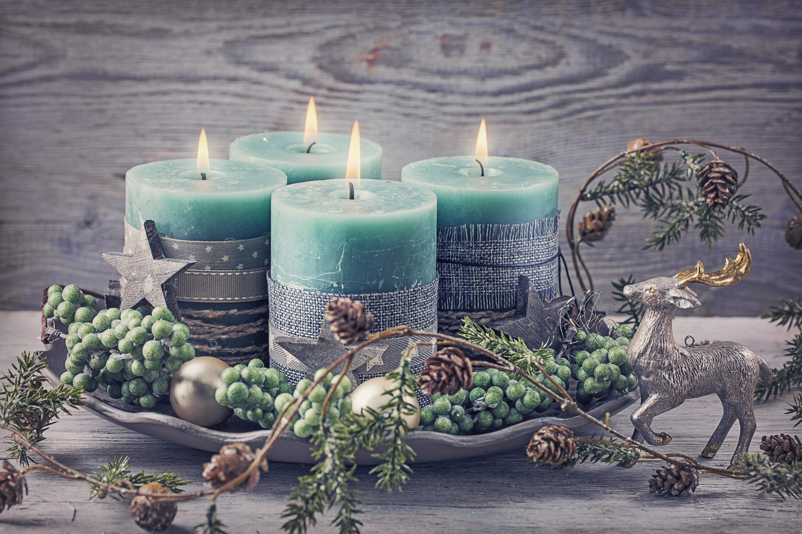 bigstock-Four-green-christmas-candle-fo-108171746